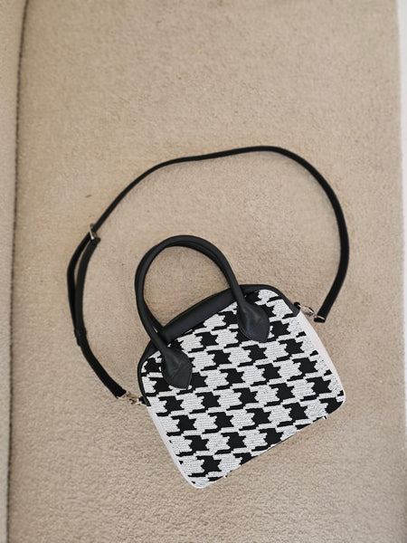 The Postcall | Houndstooth