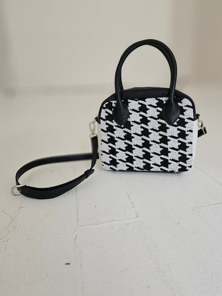 The Postcall | Houndstooth